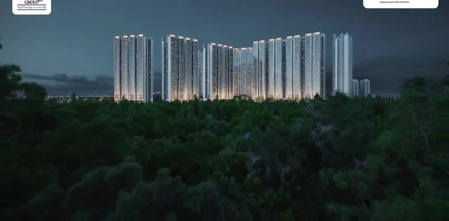The Prestige City Ghaziabad — lit high-rise towers at dusk on NH-24, Indirapuram Extn
