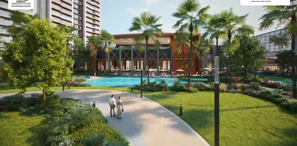 Swimming pool and clubhouse at The Prestige City